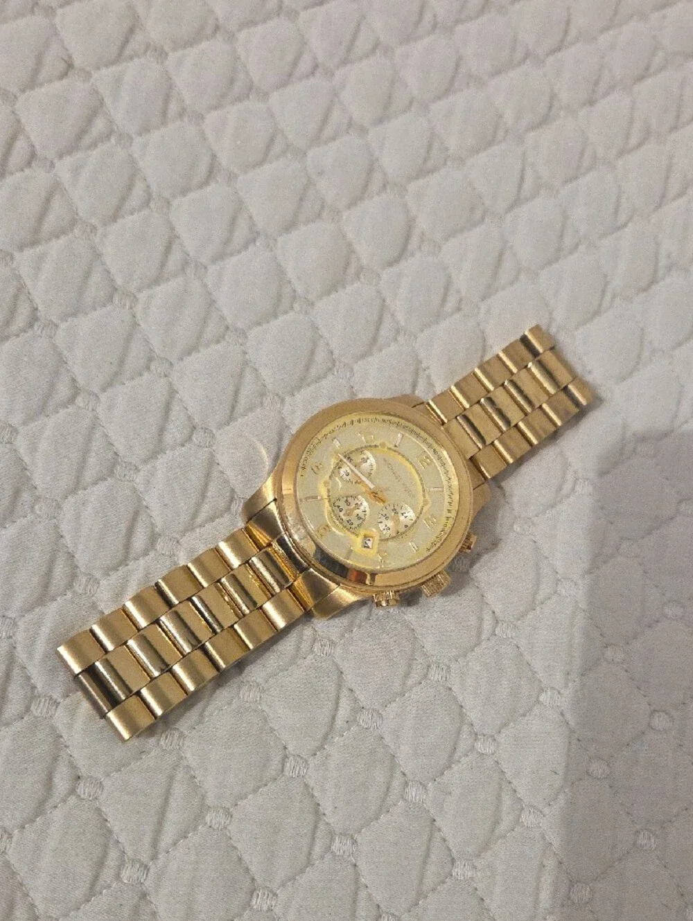 Michael Kors gold tone